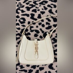 White shoulder bag with gold accents NWOT